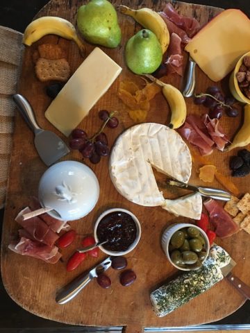 cheeseboard full of yummy appetizers