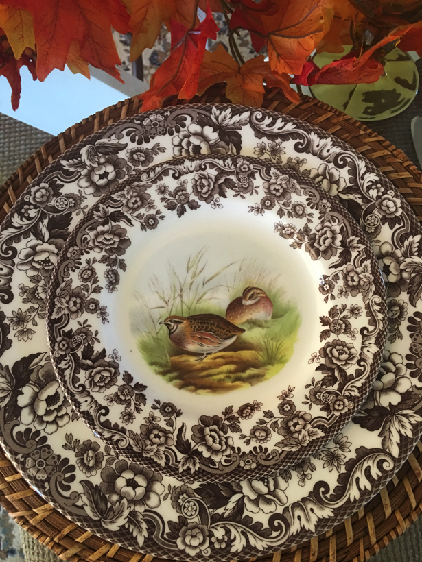 quail fowl on a salad plate