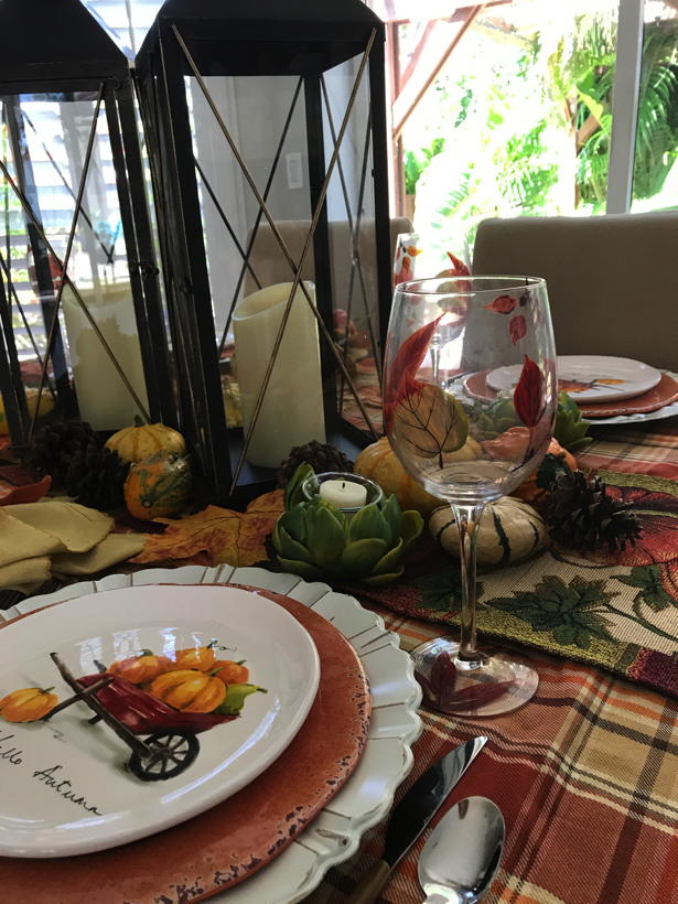 autumn dining with leaf stemmed water glasses.
