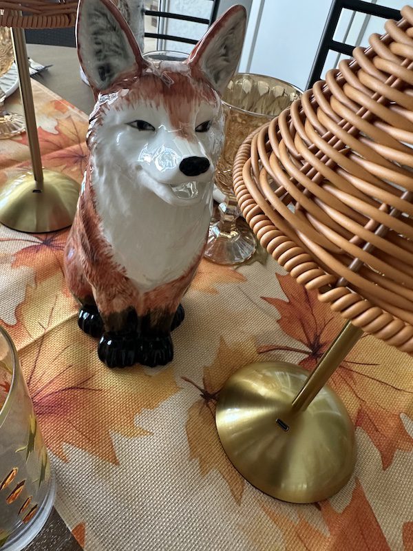 Autumn's whisper with a red fox pitcher