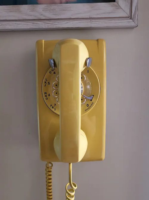 yellow wall phone